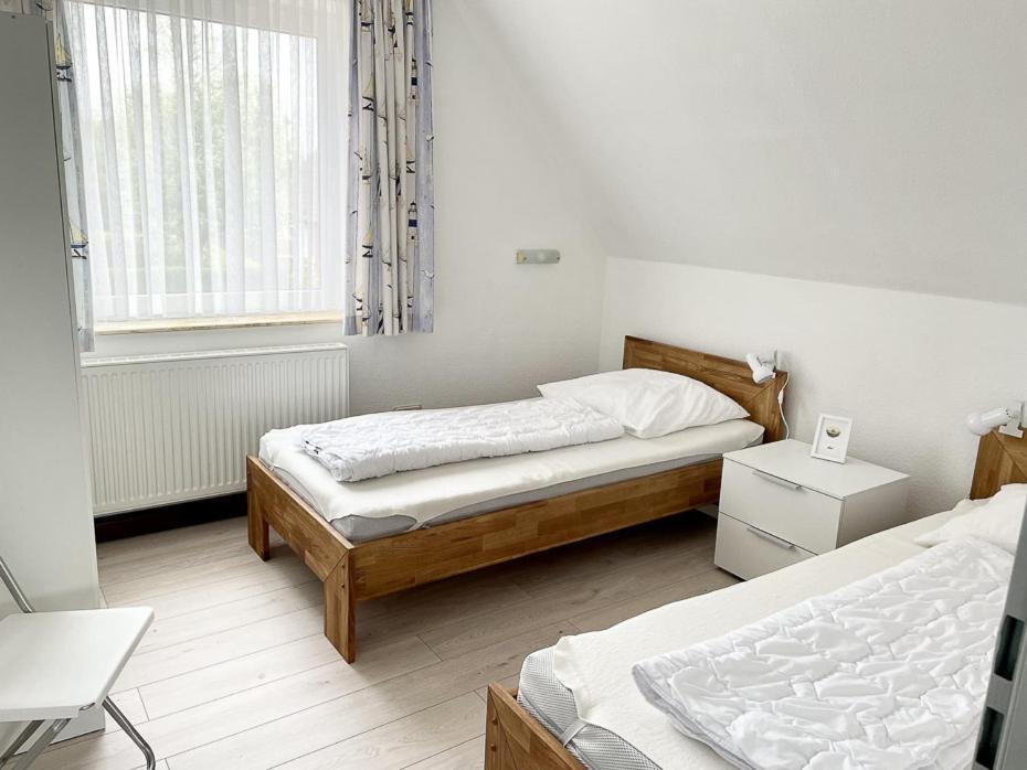 Haus Schwalbennest Appartement Bensersiel Buitenkant foto